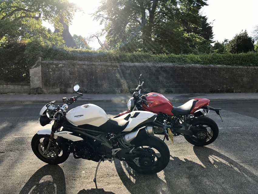 Janet's Ducati Monster 1200 and Andy's Speed Triple 1050S in Glastonbury, early on a Sunday morning