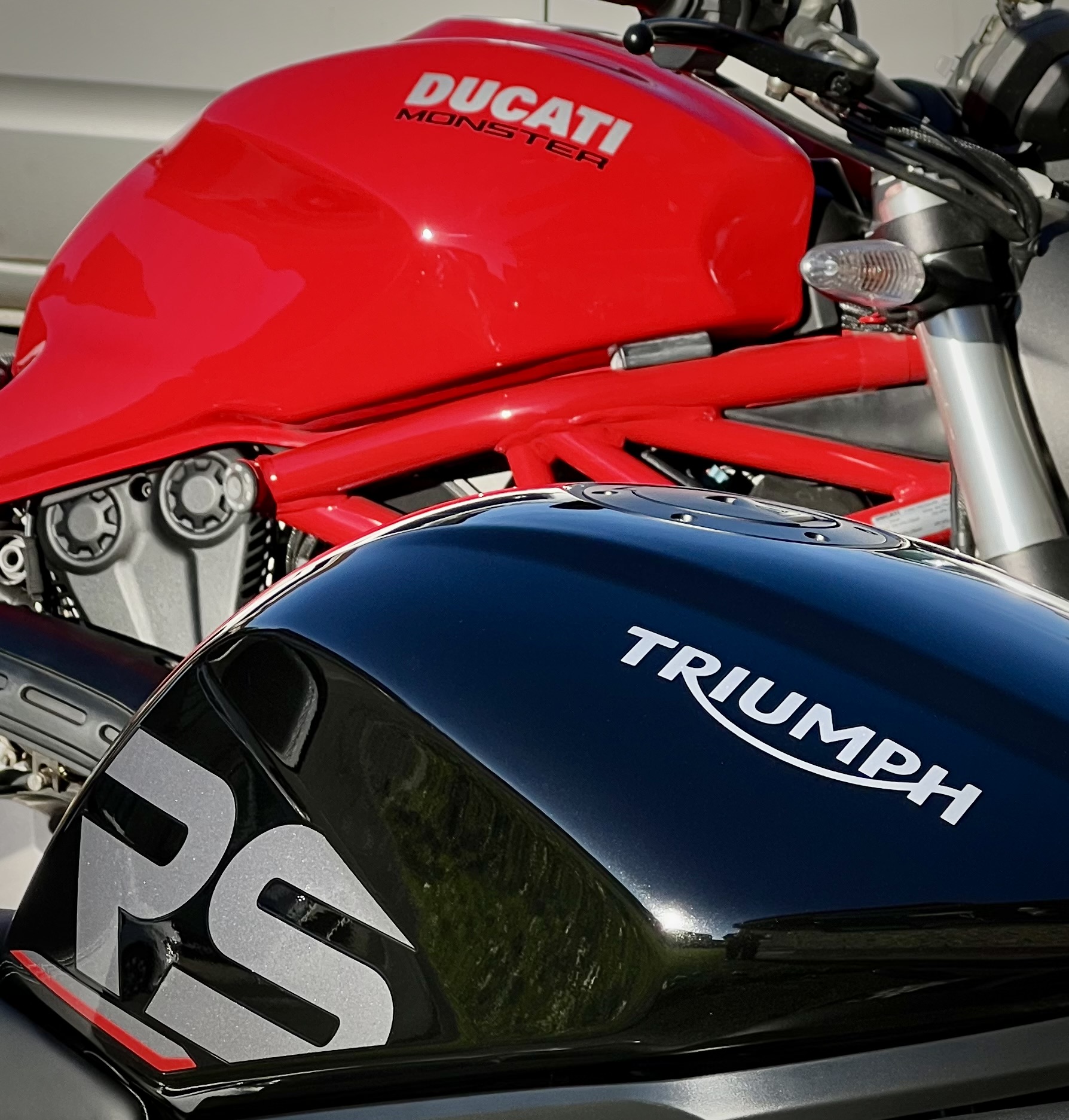 Janet's Ducati Monster 1200 and Andy's Speed Triple 1200RS petrol tanks